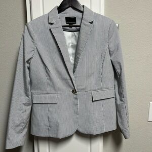 Navy and white woman’s blazer